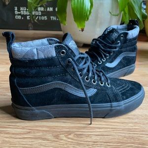 Vans high tops, black suede and gray camo denim